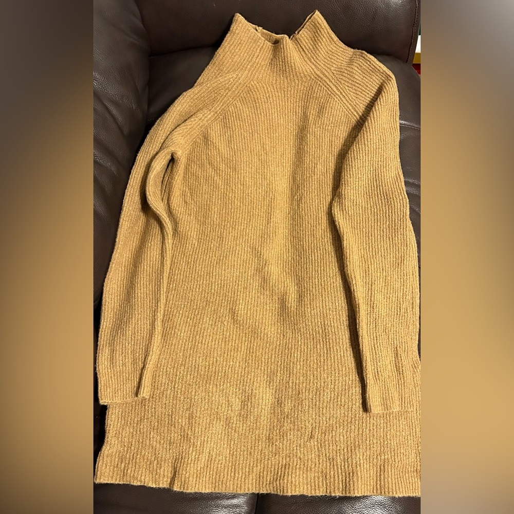 Tan turtleneck sweater